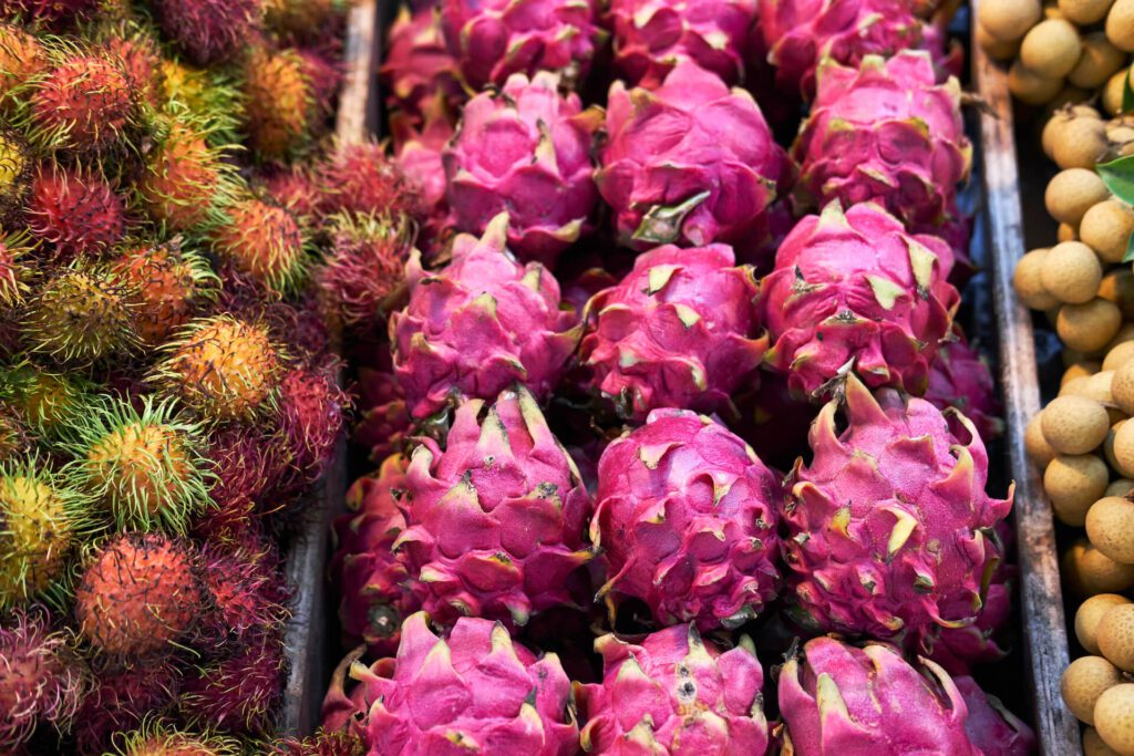 Colourful dragonfruit at a market stall